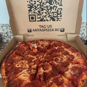 #1 X-Large Pizza with Two Toppings, Large Dinner Salad, Spaghetti, Breadsticks & Two Liter Soda