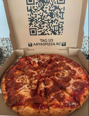 #1 X-Large Pizza with Two Toppings, Large Dinner Salad, Spaghetti, Breadsticks & Two Liter Soda